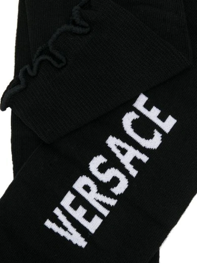 Shop Versace Contrasting Logo Socks In I463 Nero Bianco