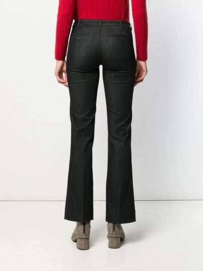 Shop Max Mara Belted Flared Leg Jeans In Black