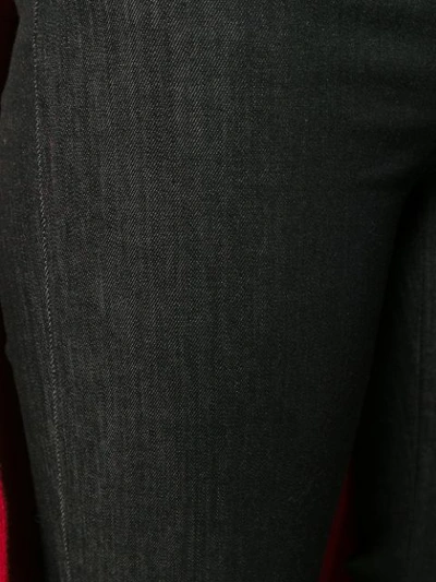 Shop Max Mara Belted Flared Leg Jeans In Black