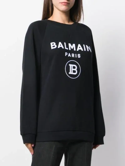 Shop Balmain Flocked Logo Sweatshirt In Black