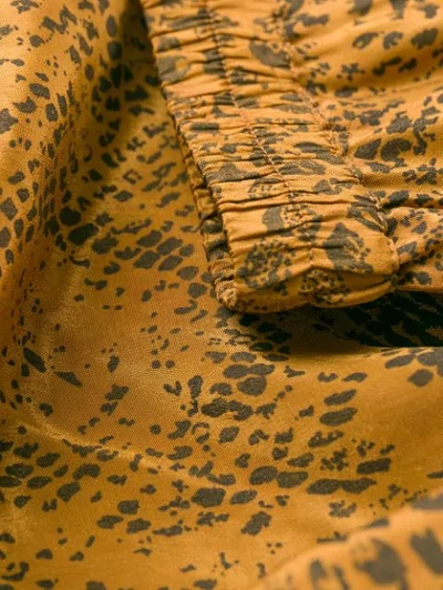 Shop Mes Demoiselles Python Print Long Skirt In Gold