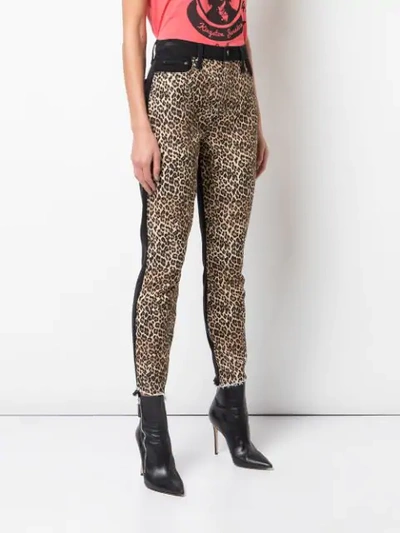 Shop Alice And Olivia Leopard Print Skinny Trousers In Black