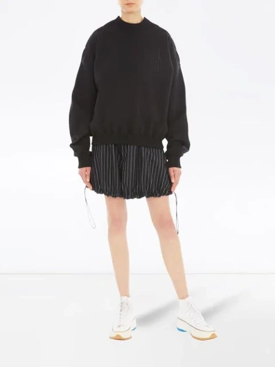 Shop Jw Anderson Donna Shorts In Black