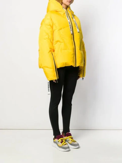 Shop Khrisjoy Oversized Puffer Jacket In Yellow