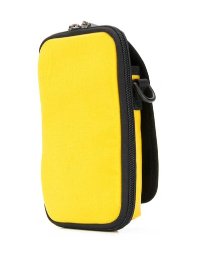 Shop Balenciaga Explorer Crossbody Pouch In Yellow