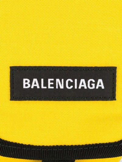 Shop Balenciaga Explorer Crossbody Pouch In Yellow