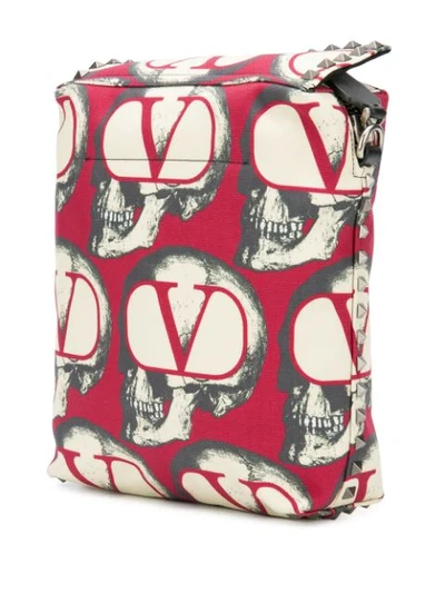 Shop Valentino X Undercover Skull-print Messenger Bag In Red