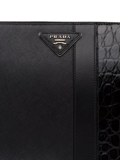 Shop Prada Saffiano Leather Zipped Clutch In Black