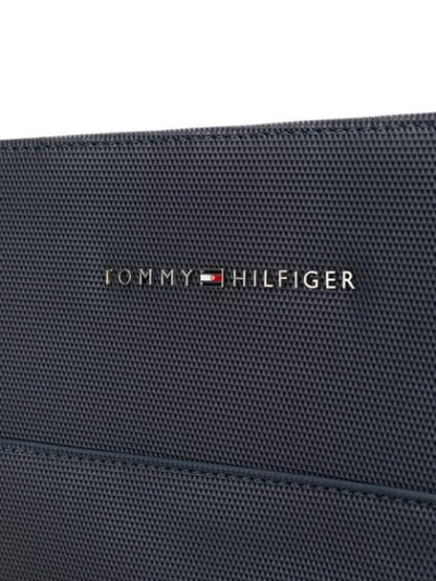 Shop Tommy Hilfiger Logo Plaque Textured Messenger Bag In Blue