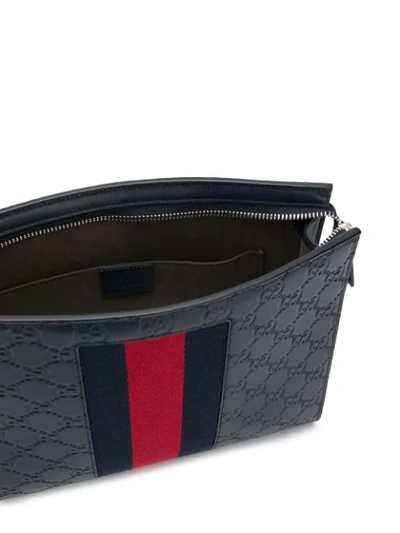 Shop Gucci Signature Web Stripe Clutch Bag In Blue