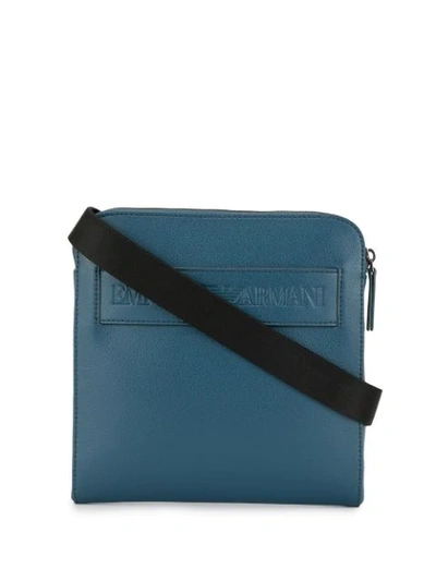Shop Emporio Armani Logo Embossed Messenger Bag In Blue