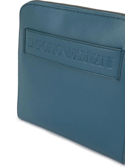 Shop Emporio Armani Logo Embossed Messenger Bag In Blue