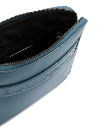 Shop Emporio Armani Logo Embossed Messenger Bag In Blue