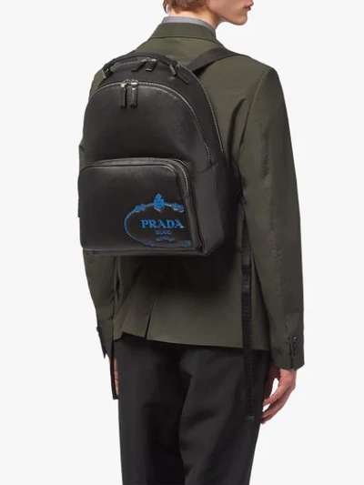 Shop Prada Saffiano Leather Logo Backpack In Black