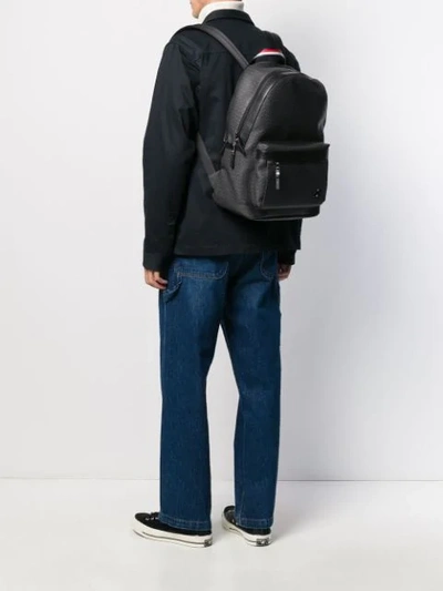 Shop Tommy Hilfiger Logo Embellished Backpack In Black