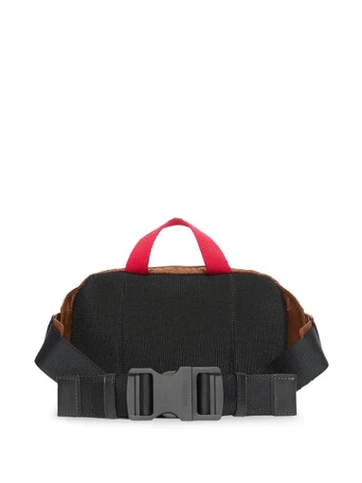 Shop Burberry Embossed Logo Belt Bag In Black