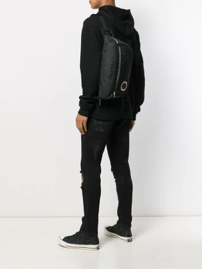 Shop Alexander Mcqueen Skull Appliqué-badge Belt Bag In Black