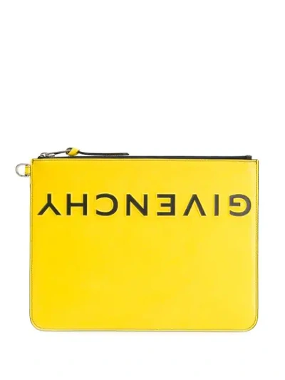 Shop Givenchy Logo Embossed Clutch In Yellow ,black
