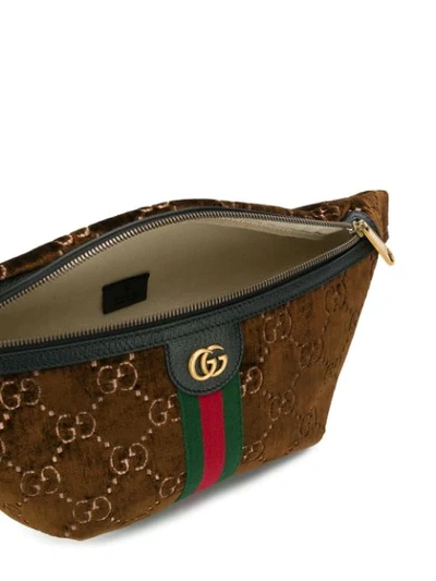 Shop Gucci Monogram Belt Bag In Braun