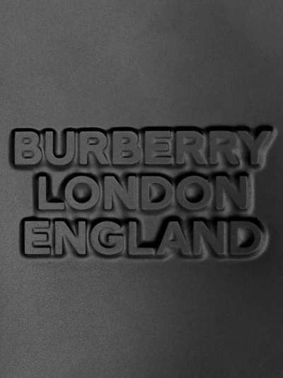 Shop Burberry Logo Embossed Harness Bag In Black