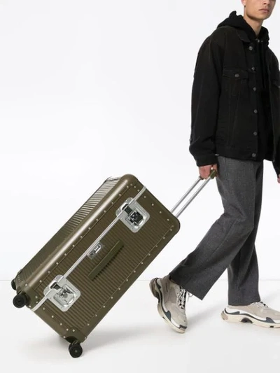 Shop Fpm - Fabbrica Pelletterie Milano X Nick Wooster Spinner 53 Aluminium Suitcase In Green