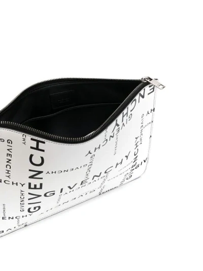 Shop Givenchy All Over Logo Clutch In Black