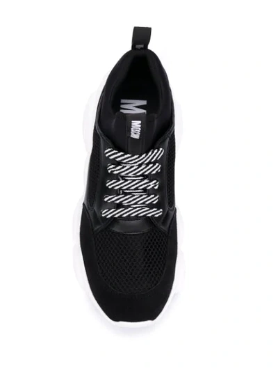 Shop Moschino Sneakers Mit Perforierten Details In 00a Rte  Mix Nero