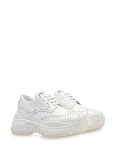 Shop Prada Chunky Perforated Sneakers In White