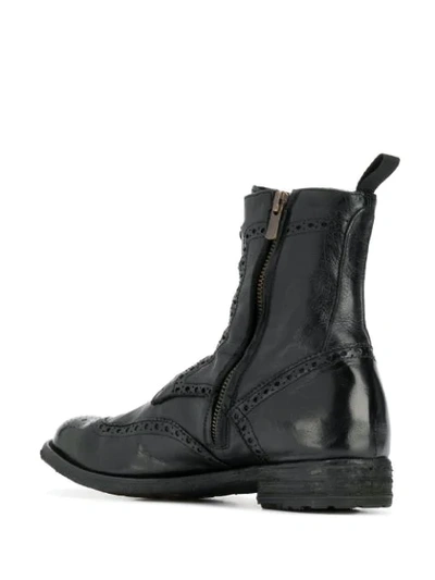 Officine Creative Punch-hole Detailed Leather Boots In Black