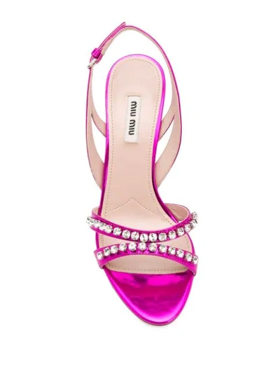 Shop Miu Miu Crystal Embellished Sandals In Pink