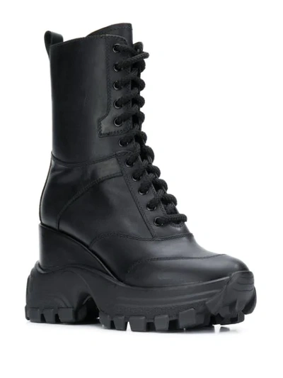 Shop Miu Miu Chunky Military Boots In Black