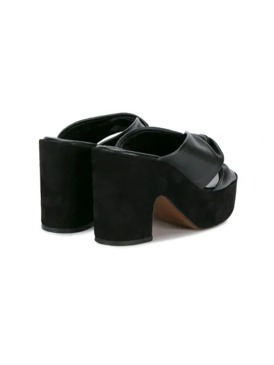 Shop Robert Clergerie Knot Front Mules In Black
