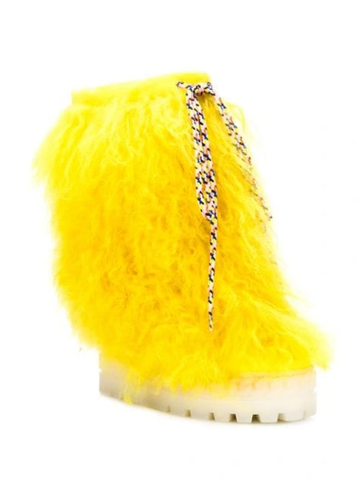 Shop Casadei Fur Snow Boots In Yellow