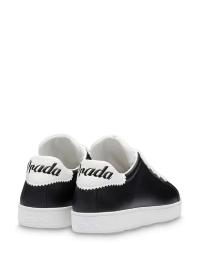 Shop Prada Leather Monochrome Sneakers In Black