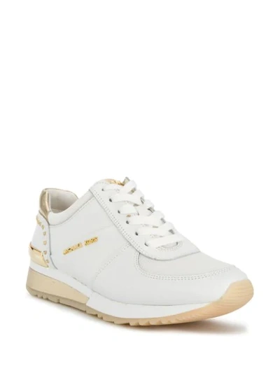 Shop Michael Kors Allie Metallic Wrap Sneakers In White