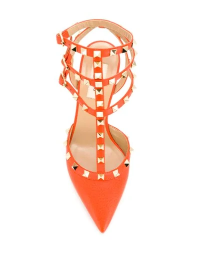 Shop Valentino Garavani Rockstud Caged Pumps In Orange