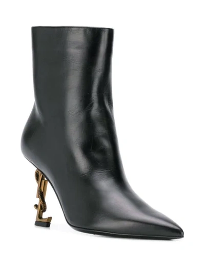 Shop Saint Laurent Opyum Logo Heel Pointed Boots In Black