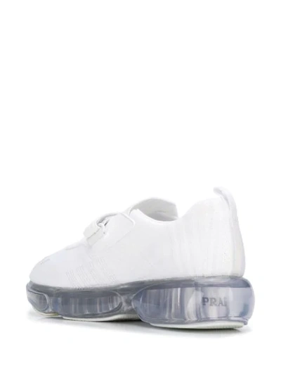 Shop Prada Cloudbust Sneakers In White