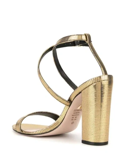 Shop Schutz Lizard Metallic Sandals In Gold