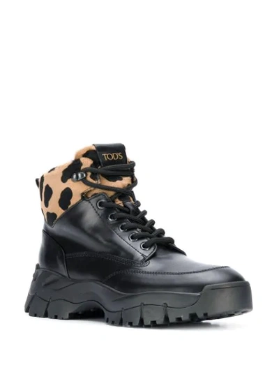 Shop Tod's Leopard Print Ankle Boots In Black