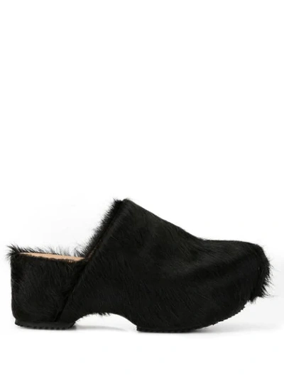 FUR-COVERED CLOGS