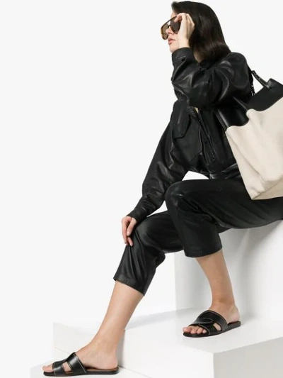 Shop Chloé Twist-strap Leather Slides In Black