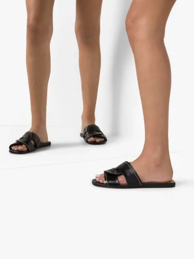 Shop Chloé Twist-strap Leather Slides In Black