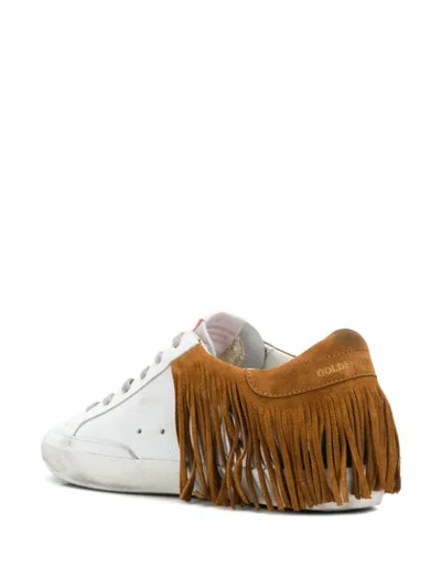 Shop Golden Goose Superstar Fringed Sneakers In White