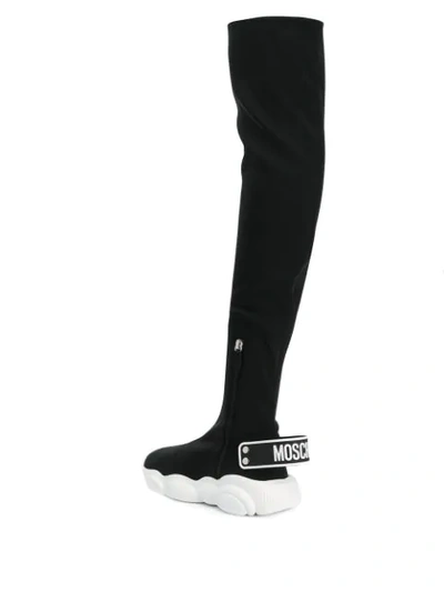 Shop Moschino Thigh-high Sneaker Boots In Black