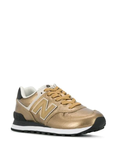 Shop New Balance 574 Low-top Sneakers In Gold