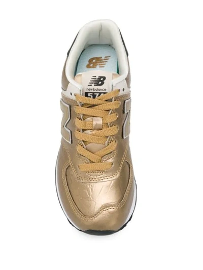 Shop New Balance 574 Low-top Sneakers In Gold