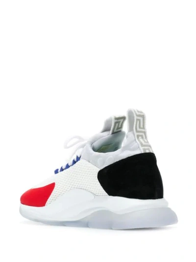 Shop Versace Cross Chainer Sneakers In White