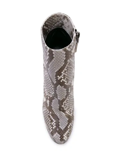 Shop Casadei Manu Snakeskin-effect Boots In City Street