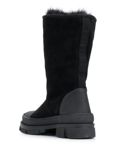 Shop Dsquared2 Fur Trimmed Ankle Boots In Black